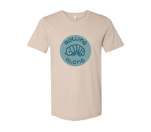 Load image into Gallery viewer, PREORDER Rolling Along T-Shirt / Teal on Bella + Canvas Tan
